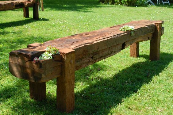 rustic bench with wooden crosspiece