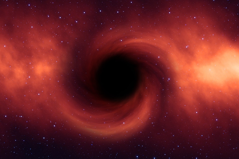 Signals from other dimensions emitted by black holes