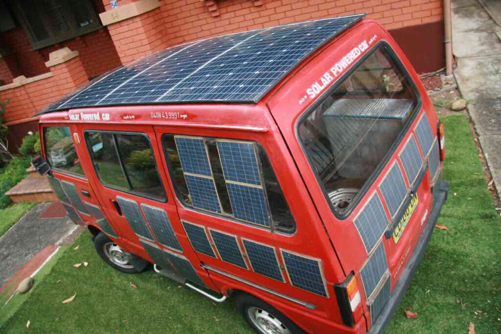 The solar electric van that drives around Sydney for free covered in panels and with three repurposed lawn mower engines