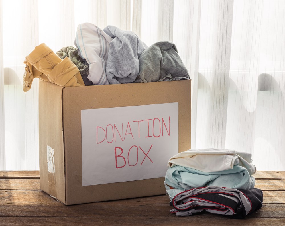 Box of used clothes ready to donate
