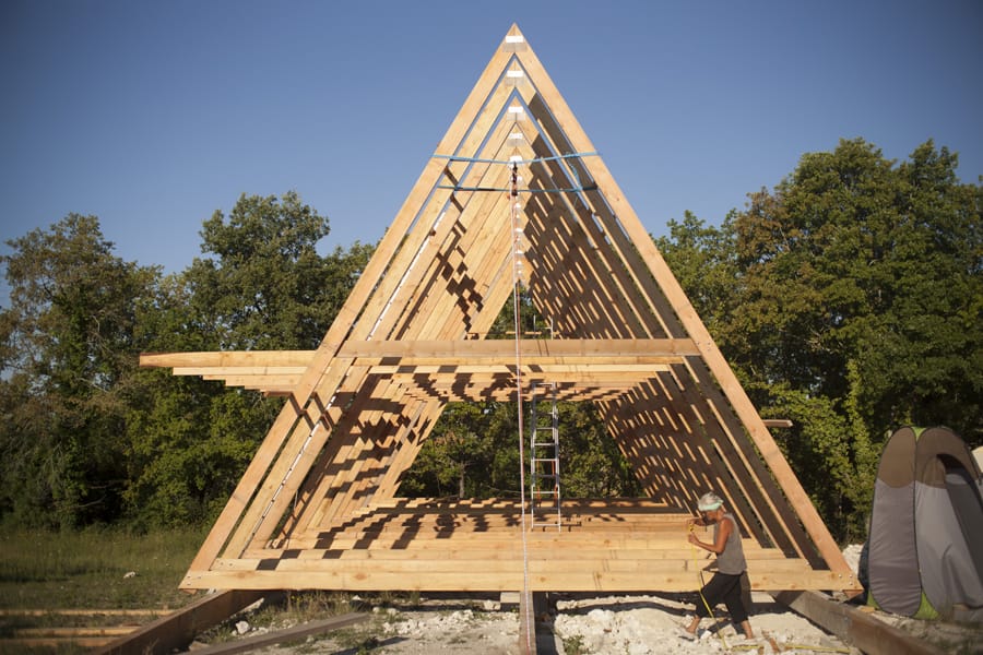 how to build your triangular wooden house + 3 free plans